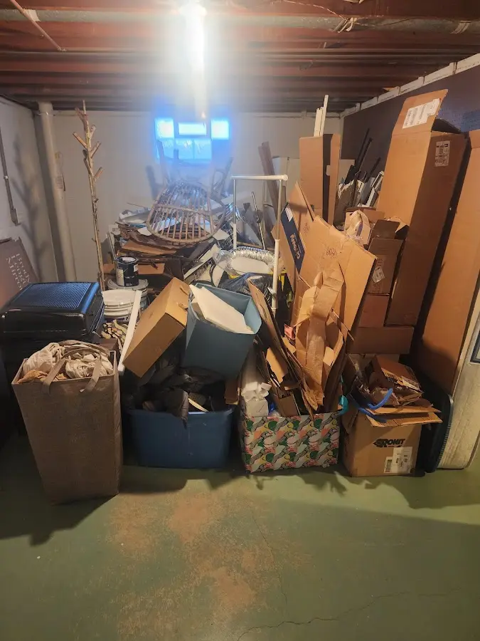 Roll-off dumpster container at job site for Construction Dumpster Rental in Bourbonnais